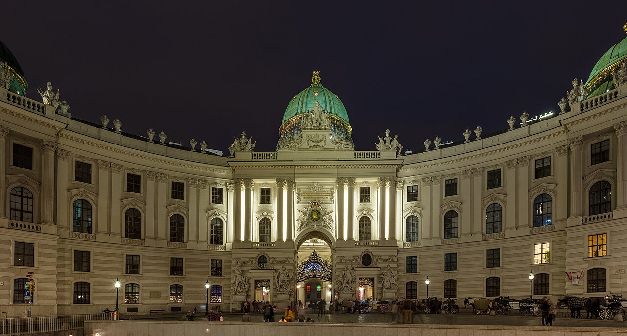 The Hofburg's Michaelertrakt at night
